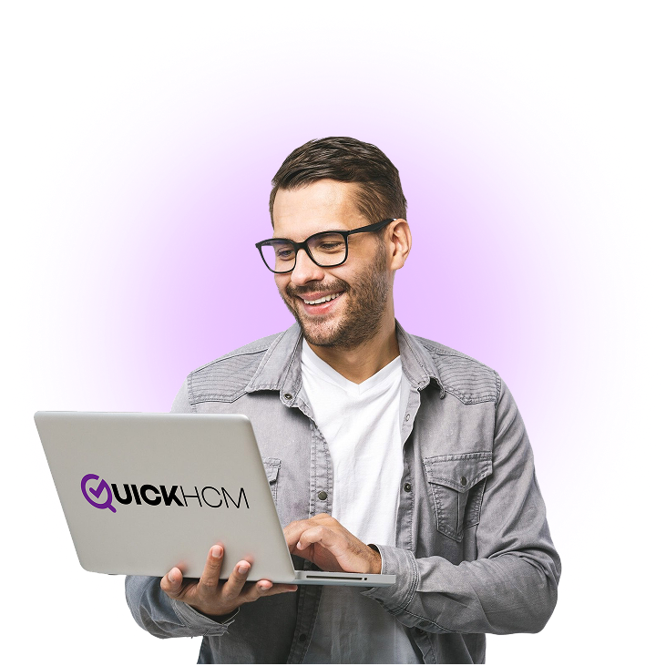 a man holding a laptop